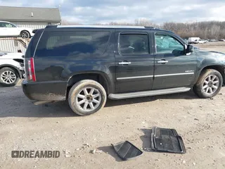 2012 GMC Yukon XL Denali with VIN 1GKS2MEF7CR200790, listed as a IAAI auction lot 41215279 with 147,663 mi miles. Bid and sale history available at carsss.com. Image 4.