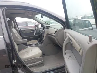 2017 Chevrolet Traverse LT with VIN 1GNKRHKDXHJ121225, listed as a IAAI auction lot 41706665 with 131,746 mi miles and . Bid and sale history available at DreamBid. Image 5.