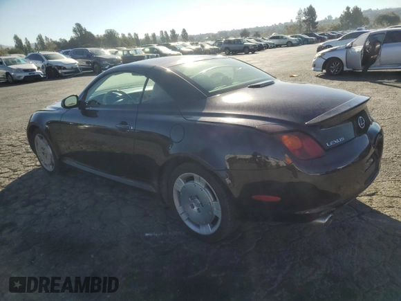 2002 Lexus SC 430 with VIN JTHFN48Y120027674, listed as a Copart auction lot 71220864 with 135,125 mi miles and Salvage Title. Bid and sale history available at DreamBid. Image 2.
