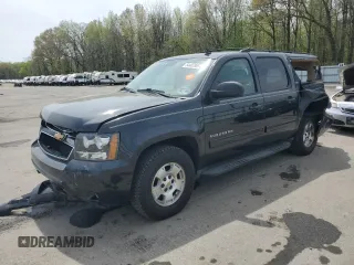 2012 Chevrolet Suburban LT with VIN 1GNSKJE77CR298049, listed as a Copart auction lot 61171865 with 247,737 mi miles and Salvage title. Bid and sale history available at DreamBid. Image 1.