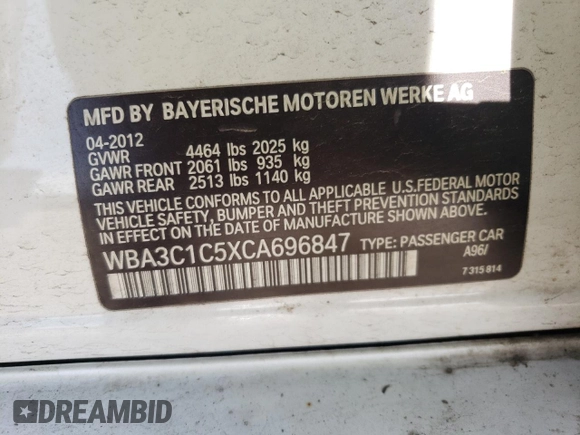 2012 BMW 3 Series 328i with VIN WBA3C1C5XCA696847, listed as a Copart auction lot 53005425 with 143,725 mi miles and Salvage title. Bid and sale history available at DreamBid. Image 14.