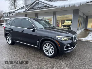2021 BMW X5 sDrive40i with VIN 5UXCR4C04M9G59370, listed as a IAAI auction lot 41592538 with 132,083 mi miles. Bid and sale history available at carsss.com. Image 1.