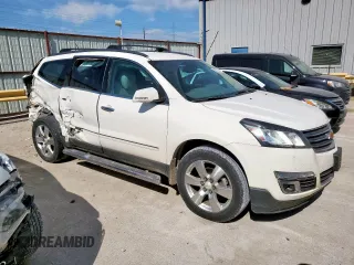 2014 Chevrolet Traverse LTZ with VIN 1GNKRJKD3EJ329725, listed as a Copart auction lot 53272755 with 221,219 mi miles and Salvage Title. Bid and sale history available at DreamBid. Image 4.