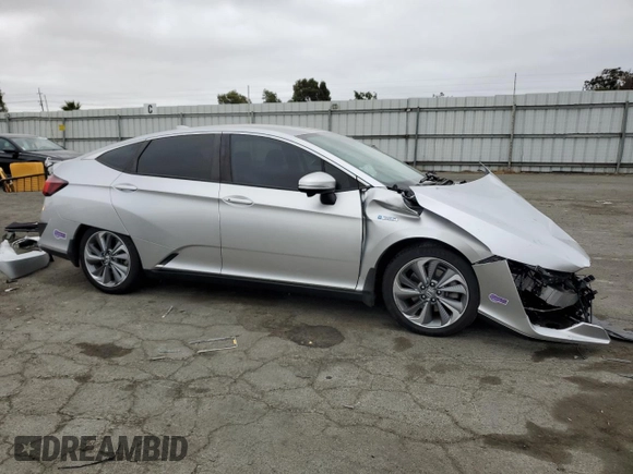 2018 Honda Clarity with VIN JHMZC5F16JC021736, listed as a Copart auction lot 71761784 with 93,541 mi miles and Salvage Title. Bid and sale history available at DreamBid. Image 4.
