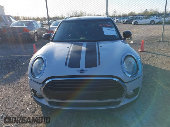 2019 MINI Clubman Cooper with VIN WMWLN5C56K2E34756, listed as a IAAI auction lot 41916663 with 85,860 mi miles and . Bid and sale history available at DreamBid. Image 12.
