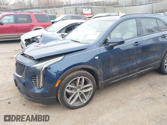 2020 Cadillac XT4 AWD Sport with VIN 1GYFZFR48LF101467, listed as a IAAI auction lot 41113381 with 72,841 mi miles and . Bid and sale history available at DreamBid. Image 2.