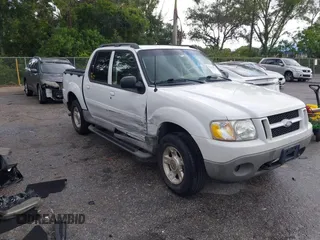 2003 Ford Explorer Sport Trac XLS with VIN 1FMDU77E63UA59921, listed as a IAAI auction lot 42531819 with 90,069 mi miles and . Bid and sale history available at DreamBid. Image 1.