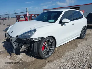 2013 Porsche Cayenne GTS with VIN WP1AD2A25DLA77759, listed as a IAAI auction lot 42316241 with 212,034 mi miles and . Bid and sale history available at DreamBid. Image 2.