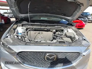 2017 Mazda CX-5 Grand Touring with VIN JM3KFADL3H0121772, listed as a IAAI auction lot 41935183 with 48,869 mi miles and . Bid and sale history available at carsss.com. Image 10.