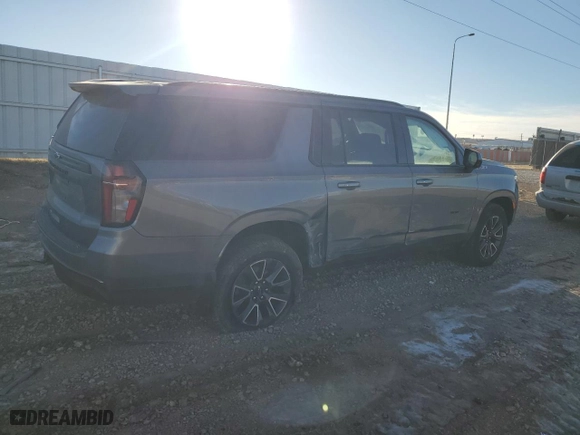 2022 Chevrolet Suburban Z71 with VIN 1GNSKDKD4NR255061, listed as a Copart auction lot 85507694 with 107,856 mi miles and Salvage Title. Bid and sale history available at carsss.com. Image 3.