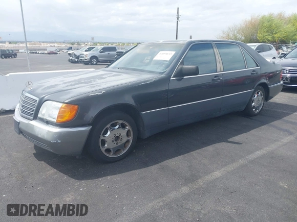 1992 Mercedes-Benz 500 z VIN WDBGA51E0NA023491, wystawiony jako IAAI lot #42058835 z przebiegiem 260 421 mil mil oraz . Historia ofert i sprzedaży dostępna na DreamBid. Obrazek 2.