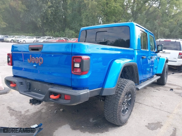2023 Jeep Gladiator Mojave with VIN 1C6JJTEG0PL593061, listed as a IAAI auction lot 40287955 with 3,930 mi miles. Bid and sale history available at carsss.com. Image 4.