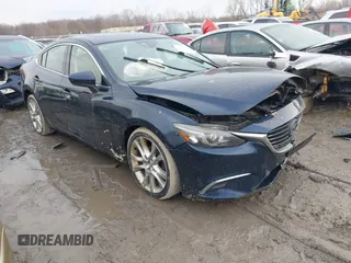 2016 Mazda Mazda6 i Touring with VIN JM1GJ1T54G1434497, listed as a IAAI auction lot 41654012 with 133,901 mi miles. Bid and sale history available at carsss.com. Image 1.