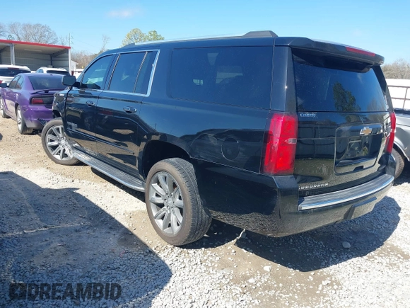 2019 Chevrolet Suburban LT with VIN 1GNSCJKC5KR360318, listed as a IAAI auction lot 41504344 with 82,997 mi miles and . Bid and sale history available at DreamBid. Image 3.