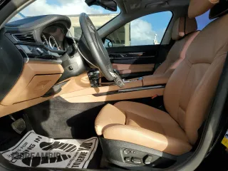 2011 BMW 7 Series 740i with VIN WBAKA4C59BC392351, listed as a Copart auction lot 84942304 with 76,874 mi miles and Salvage Title. Bid and sale history available at carsss.com. Image 7.