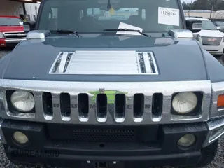 2005 Hummer H2 SUT with VIN 5GRGN22U15H114401, listed as a IAAI auction lot 41268764 with 166,651 mi miles. Bid and sale history available at carsss.com. Image 10.