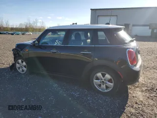 2016 MINI Hardtop 4 Door with VIN WMWXU1C50G2D09465, listed as a Copart auction lot 54975005 with 62,715 mi miles and Salvage Title. Bid and sale history available at DreamBid. Image 2.