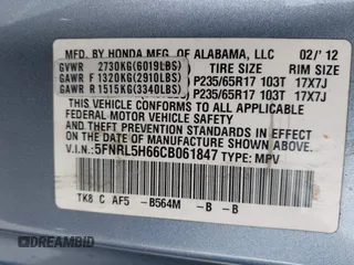 2012 Honda Odyssey EX-L with VIN 5FNRL5H66CB061847, listed as a IAAI auction lot 42162377 with 217,204 mi miles and . Bid and sale history available at DreamBid. Image 9.