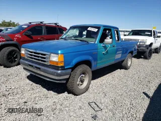 1992 Ford Ranger XLT with VIN 1FTCR15XXNPA74071, listed as a Copart auction lot 68507644 with 313,517 mi miles and Salvage Title. Bid and sale history available at DreamBid. Image 1.