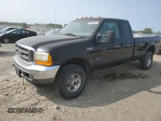 2001 Ford F-350 XL with VIN 1FTSX31F11ED72055, listed as a Copart auction lot 66164624 with 228,597 mi miles and Salvage Title. Bid and sale history available at DreamBid. Image 1.