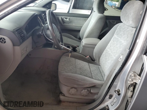 2005 Kia Sorento LX z VIN KNDJC733855449656, wystawiony jako Copart lot #52234685 z przebiegiem 114 398 mil mil oraz Szkoda całkowita • Salvage title. Historia ofert i sprzedaży dostępna na DreamBid. Obrazek 7.