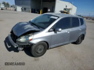 2007 Honda Fit with VIN JHMGD38467S051057, listed as a Copart auction lot 62790875 with 210,507 mi miles and Salvage title. Bid and sale history available at DreamBid. Image 1.