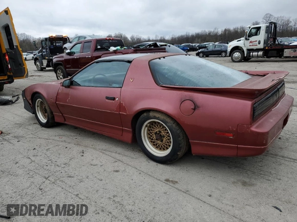 1989 Pontiac Firebird z VIN 1G2FW2181KL244335, wystawiony jako Copart lot #51469365 z przebiegiem 150 615 mil mil oraz Czysty tytuł • Clean title. Historia ofert i sprzedaży dostępna na DreamBid. Obrazek 2.