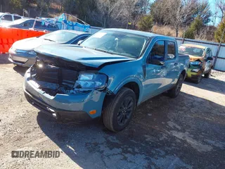 2023 Ford Maverick XL z VIN 3FTTW8F90PRB00416, wystawiony jako IAAI lot #38472866 z przebiegiem 1 427 mil mil oraz . Historia ofert i sprzedaży dostępna na DreamBid. Obrazek 2.