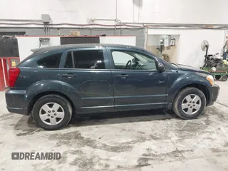 2007 Dodge Caliber with VIN 1B3HB28B27D321850, listed as a IAAI auction lot 41617311 with 180,446 mi miles. Bid and sale history available at carsss.com. Image 13.