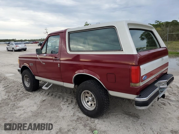 1990 Ford Bronco Custom with VIN 1FMEU15H2LLA70449, listed as a Copart auction lot 77953604 with 12,519 mi miles and Salvage Title. Bid and sale history available at DreamBid. Image 2.
