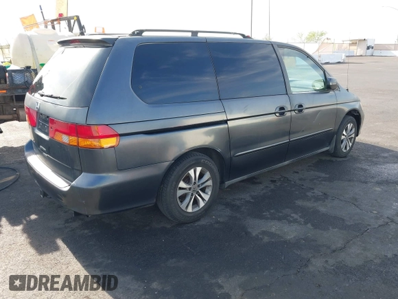 2002 Honda Odyssey EX with VIN 2HKRL18632H512158, listed as a IAAI auction lot 42354621 with 240,373 mi miles and . Bid and sale history available at DreamBid. Image 4.
