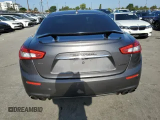 2015 Maserati Ghibli z VIN ZAM57XSA2F1159407, wystawiony jako Copart lot #57806715 z przebiegiem 93 185 mil mil oraz Szkody całkowita. Historia ofert i sprzedaży dostępna na DreamBid. Obrazek 6.