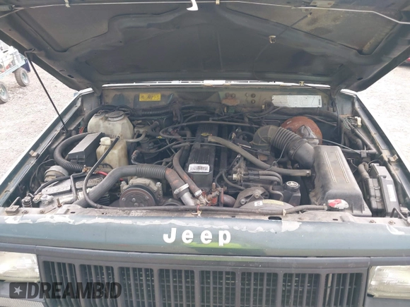 1993 Jeep Cherokee Sport with VIN 1J4FJ68S2PL622716, listed as a IAAI auction lot 42570145 with 183,159 mi miles and . Bid and sale history available at DreamBid. Image 10.