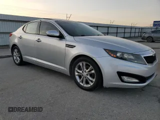 2012 Kia Optima EX with VIN 5XXGN4A7XCG037286, listed as a Copart auction lot 52386335 with 114,750 mi miles and Salvage Title. Bid and sale history available at carsss.com. Image 4.