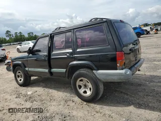 2000 Jeep Cherokee with VIN 1J4FT48S3YL139915, listed as a Copart auction lot 69840924 with 249,720 mi miles and Salvage title. Bid and sale history available at DreamBid. Image 2.