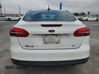 2017 Ford Focus SE with VIN 1FADP3F27HL217567, listed as a Copart auction lot 53749175 with 62,727 mi miles and Salvage title. Bid and sale history available at DreamBid. Image 6.