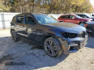 2019 BMW X3 M40i with VIN 5UXTS3C54K0Z09005, listed as a Copart auction lot 87682015 with Not Provided miles and Salvage Title. Bid and sale history available at DreamBid. Image 4.