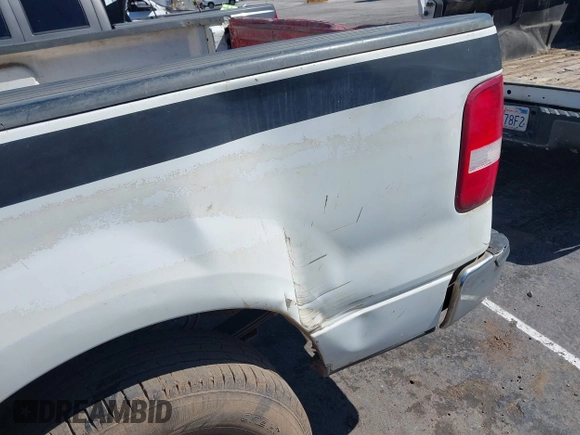 2005 Ford F-150 XLT with VIN 1FTRW12W65FA14163, listed as a IAAI auction lot 41754075 with 94,853 mi miles. Bid and sale history available at carsss.com. Image 6.