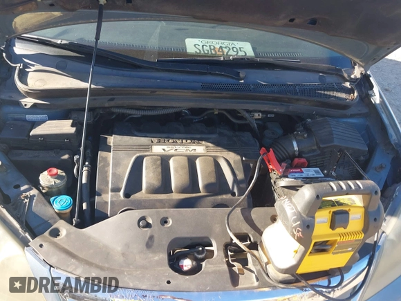 2010 Honda Odyssey EX-L with VIN 5FNRL3H77AB096732, listed as a IAAI auction lot 41831744 with 22,523 mi miles and . Bid and sale history available at DreamBid. Image 10.