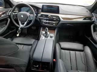 2020 BMW 5 Series with VIN WBAJB1C03LCD19170, listed as a Copart auction lot 64942594 with 66,584 mi miles and Salvage title. Bid and sale history available at DreamBid. Image 8.