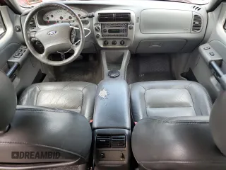 2004 Ford Explorer Sport Trac XLS z VIN 1FMZU77K84UB23731, wystawiony jako Copart lot #65250575 z przebiegiem 236 109 mil mil oraz Szkoda całkowita • Salvage title. Historia ofert i sprzedaży dostępna na DreamBid. Obrazek 8.