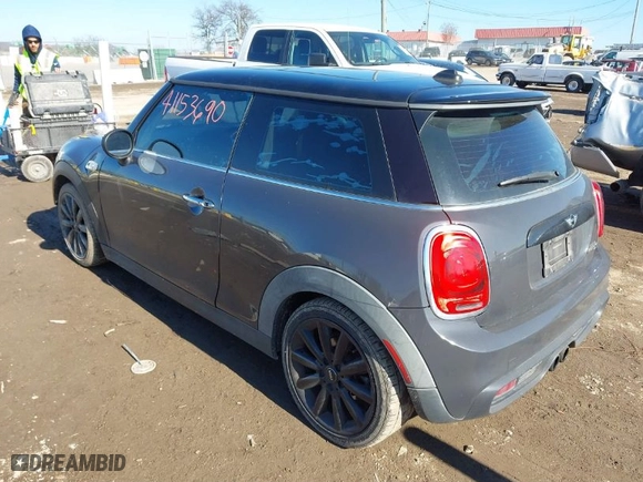 2015 MINI Cooper Hardtop S with VIN WMWXP7C54F2A37754, listed as a IAAI auction lot 41153690 with 99,528 mi miles. Bid and sale history available at carsss.com. Image 3.