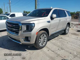 2021 GMC Yukon SLT with VIN 1GKS1BKD3MR168352, listed as a IAAI auction lot 41832252 with 95,750 mi miles. Bid and sale history available at carsss.com. Image 2.