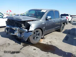 2004 Nissan Titan LE with VIN 1N6AA07A94N532546, listed as a IAAI auction lot 42103434 with 197,461 mi miles and . Bid and sale history available at DreamBid. Image 2.