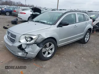 2011 Dodge Caliber Mainstreet with VIN 1B3CB3HA2BD238032, listed as a IAAI auction lot 41865918 with 98,022 mi miles and . Bid and sale history available at DreamBid. Image 2.