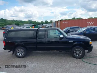 2009 Ford Ranger XLT with VIN 1FTZR45E19PA25647, listed as a IAAI auction lot 42251633 with 265,801 mi miles and . Bid and sale history available at DreamBid. Image 13.