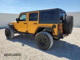 2013 Jeep Wrangler Unlimited Rubicon with VIN 1C4BJWFG9DL543798, listed as a Copart auction lot 49322385 with 159,674 mi miles and Salvage Title. Bid and sale history available at carsss.com. Image 2.