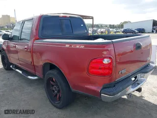 2001 Ford F-150 SuperCrew XLT with VIN 1FTRW07L71KD64069, listed as a IAAI auction lot 41914660 with 1 mi miles. Bid and sale history available at carsss.com. Image 3.