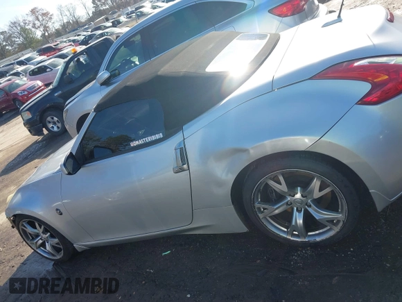 2012 Nissan 370Z Touring with VIN JN1AZ4FH4CM371189, listed as a IAAI auction lot 41088025 with 74,076 mi miles. Bid and sale history available at carsss.com. Image 15.