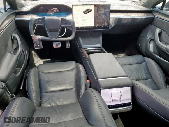 2023 Tesla Model S with VIN 5YJSA1E59PF512318, listed as a Copart auction lot 58377895 with 34,402 mi miles and Salvage title. Bid and sale history available at DreamBid. Image 8.
